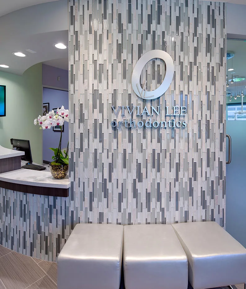 Vivian Lee Orthodontics office lobby with mosaic tile wall and 3D signage